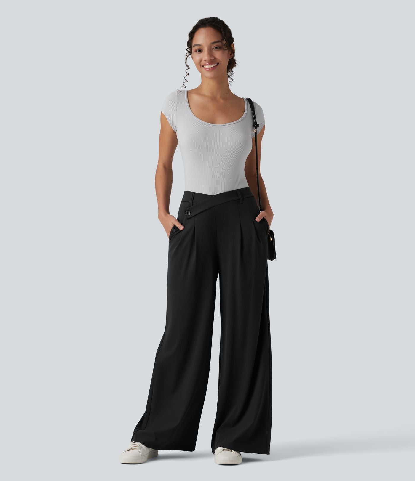 Pantalon tailleur évasé asymétrique taille mi-haute avec poches