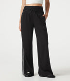 Pantalon baggy côtelé taille haute gainant avec cordon ajustable, bandes latérales et poches