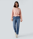 Sweat-shirt en coton col rond à manches longues avec ourlet à volants