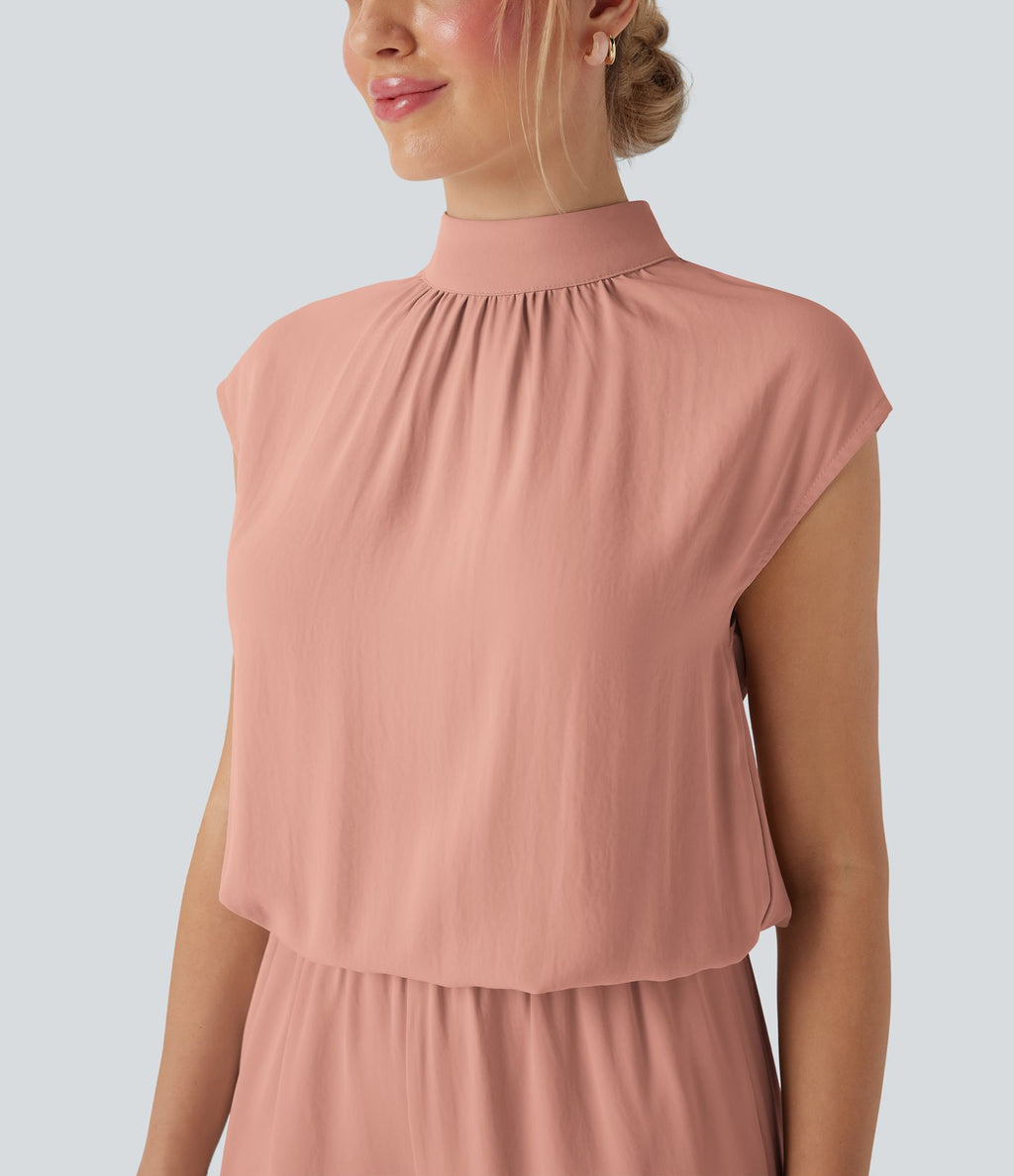 Combinaison pantalon tailleur jambes larges col montant dos goutte d'eau manches courtes avec poches latérales