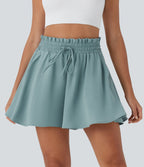Short large décontracté taille haute façon paperbag avec cordon, poches latérales et aspect lin