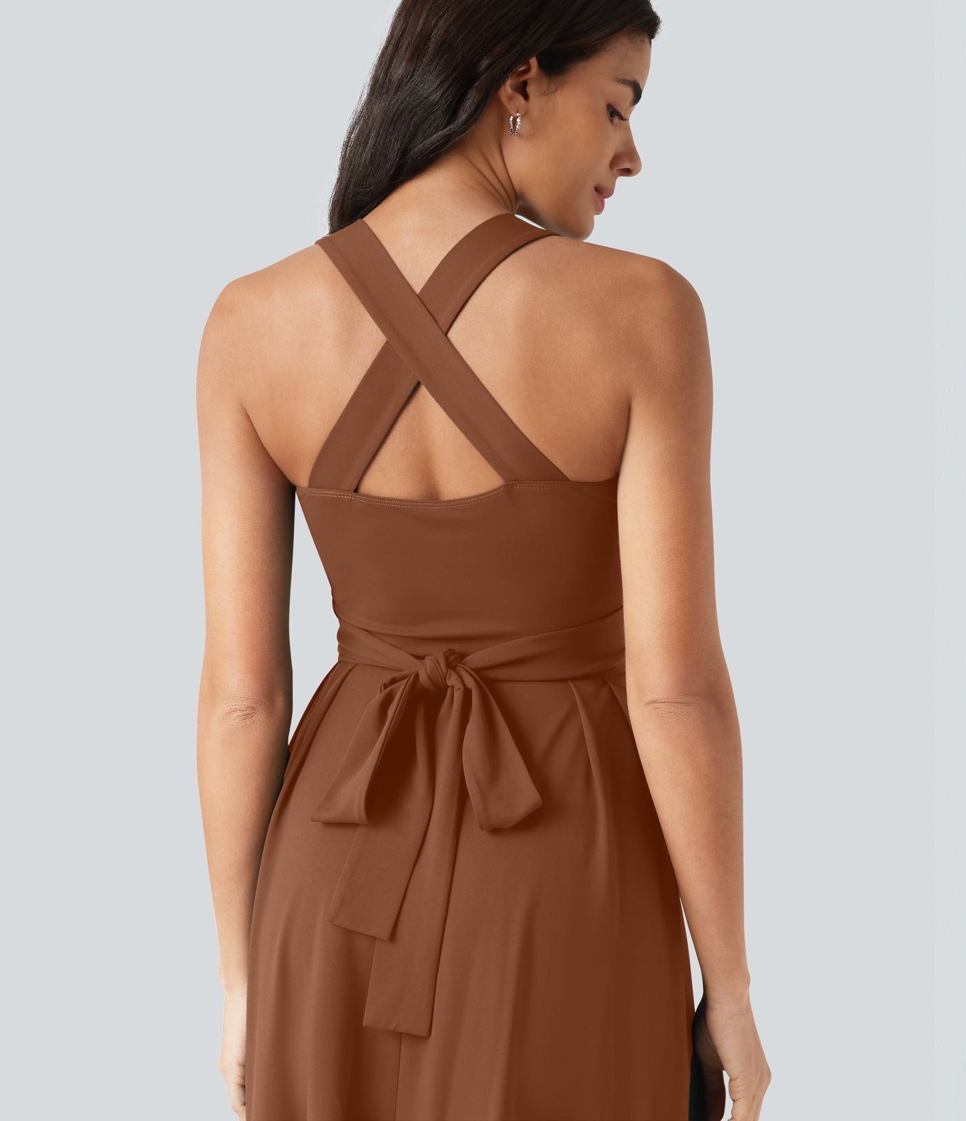Robe midi fluide sans manches décolleté cœur avec bretelles croisées, nœud dans le dos et poches