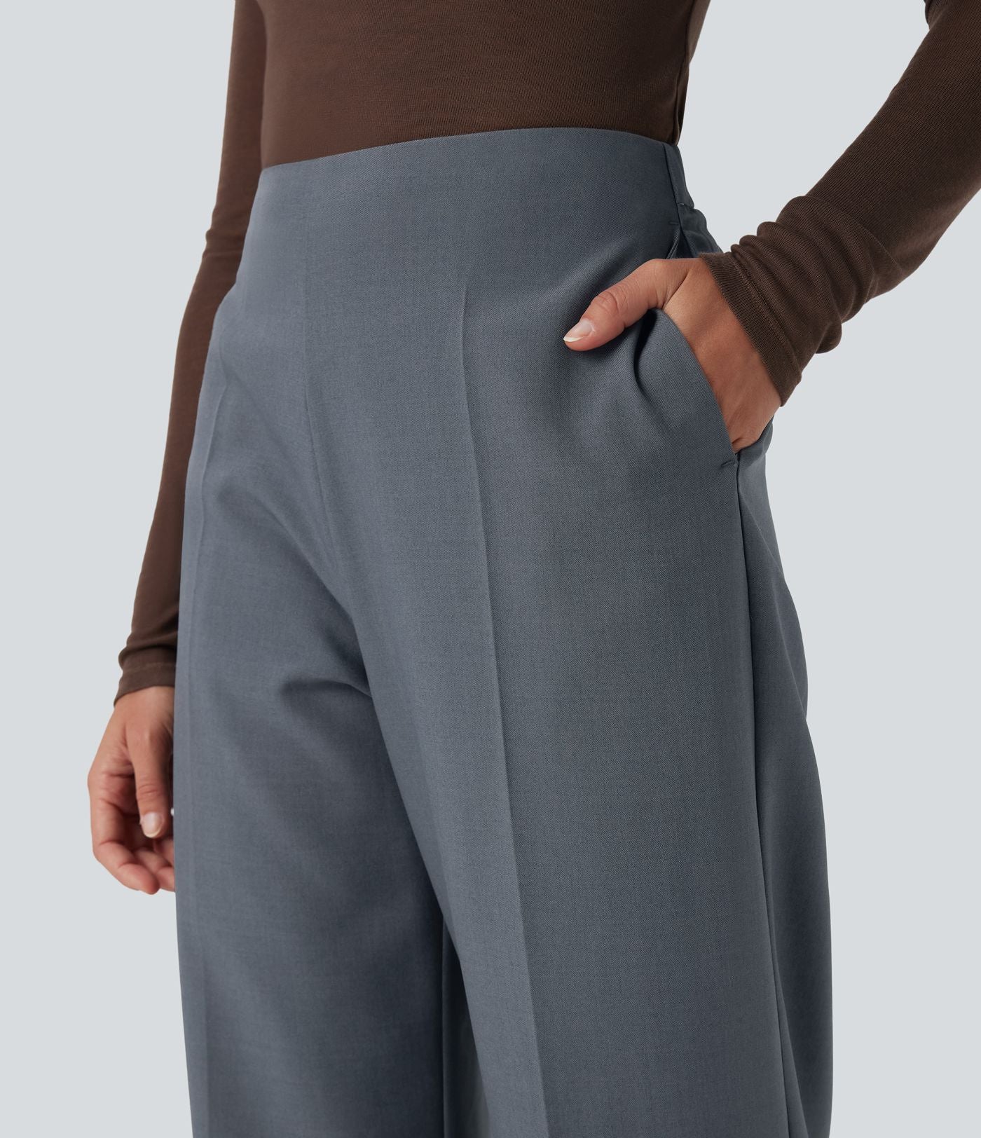 Pantalon tailleur taille haute fermeture éclair jambe droite avec poches