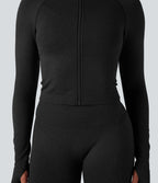 Veste de yoga courte ajustée Seamless Flow à col montant, manches longues et trous pour les pouces