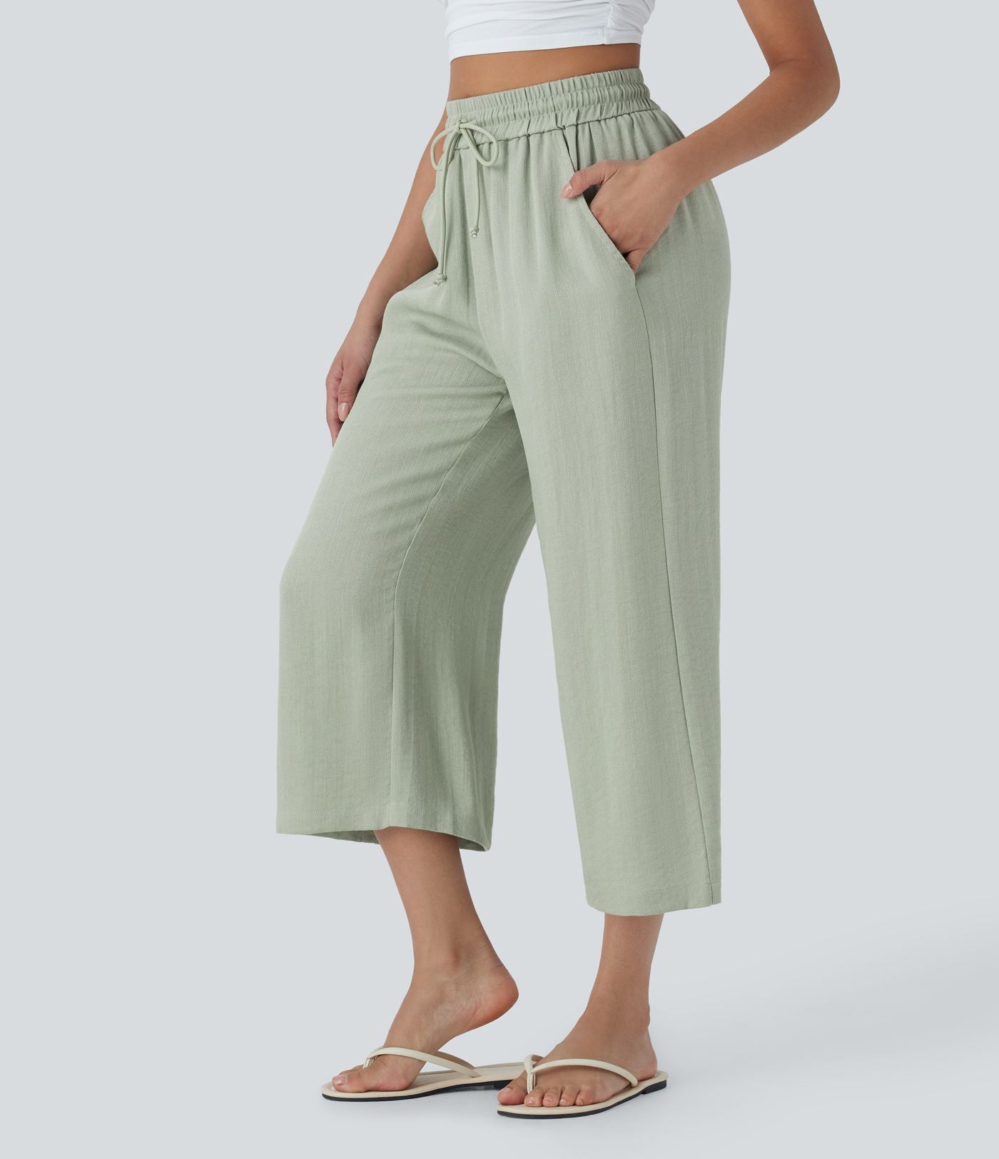 Pantalon décontracté aspect lin 7/8 à taille haute, jambe large avec cordon de serrage et poches latérales