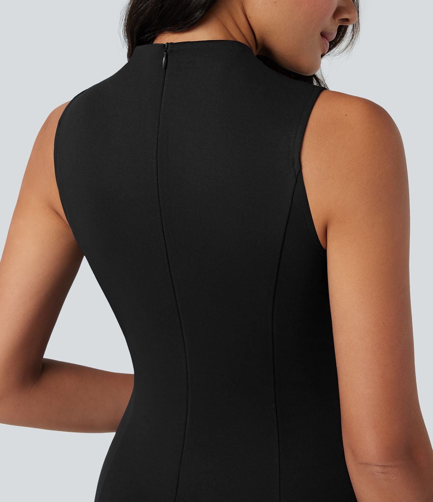 Robe mi-longue col montant sans manches avec poches