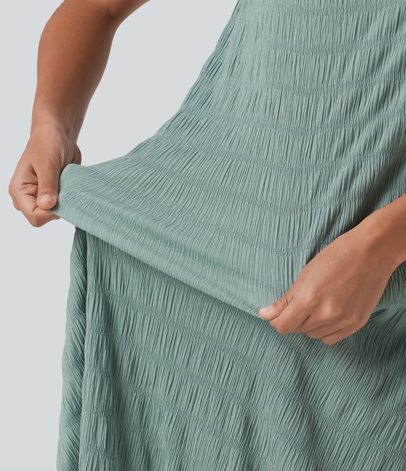 Robe midi sans manches à encolure arrondie avec coussinets amovibles et ourlet à volants
