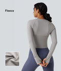 Top de sport yoga polaire col rond manches longues avec trous pouces