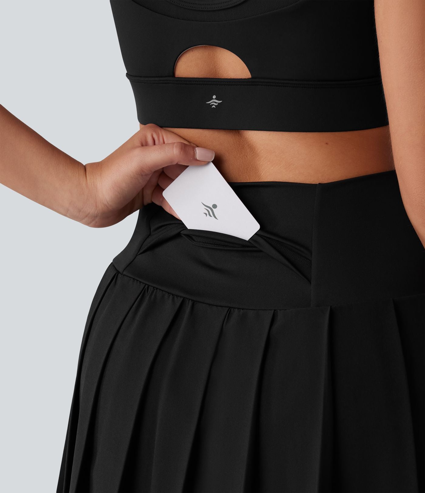 Breezeful™ Jupe mini sport 2 en 1 plissée taille haute mesh contrasté séchage rapide avec poches
