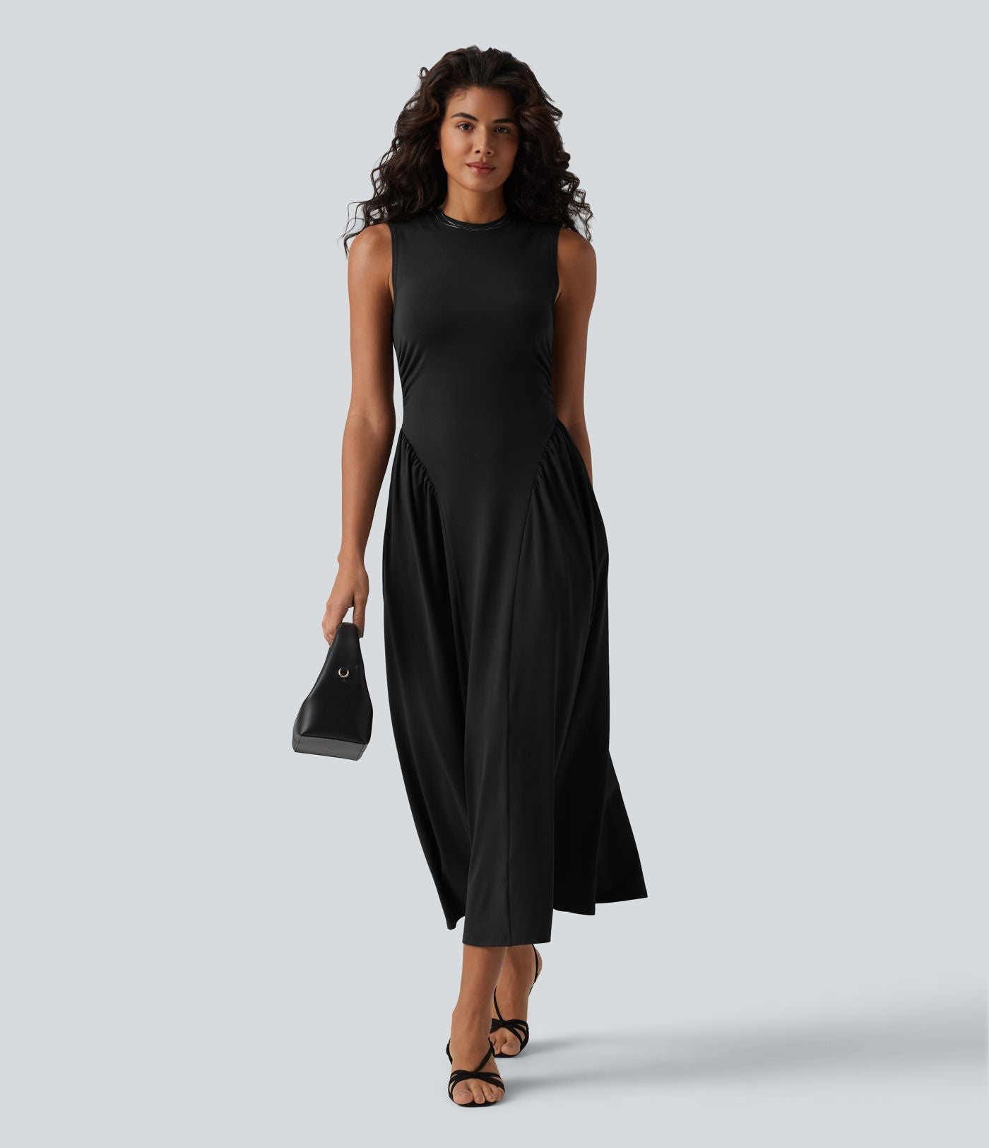 Robe midi casual fluide sans manches à col rond avec poches