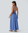 Robe longue fluide fendue avec poches latérales, dos nu et effet torsadé