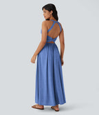 Robe longue fluide fendue avec poches latérales, dos nu et effet torsadé