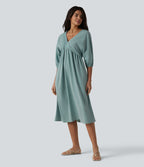 Robe midi casual col V à manches trois-quarts aspect lin, avec poches