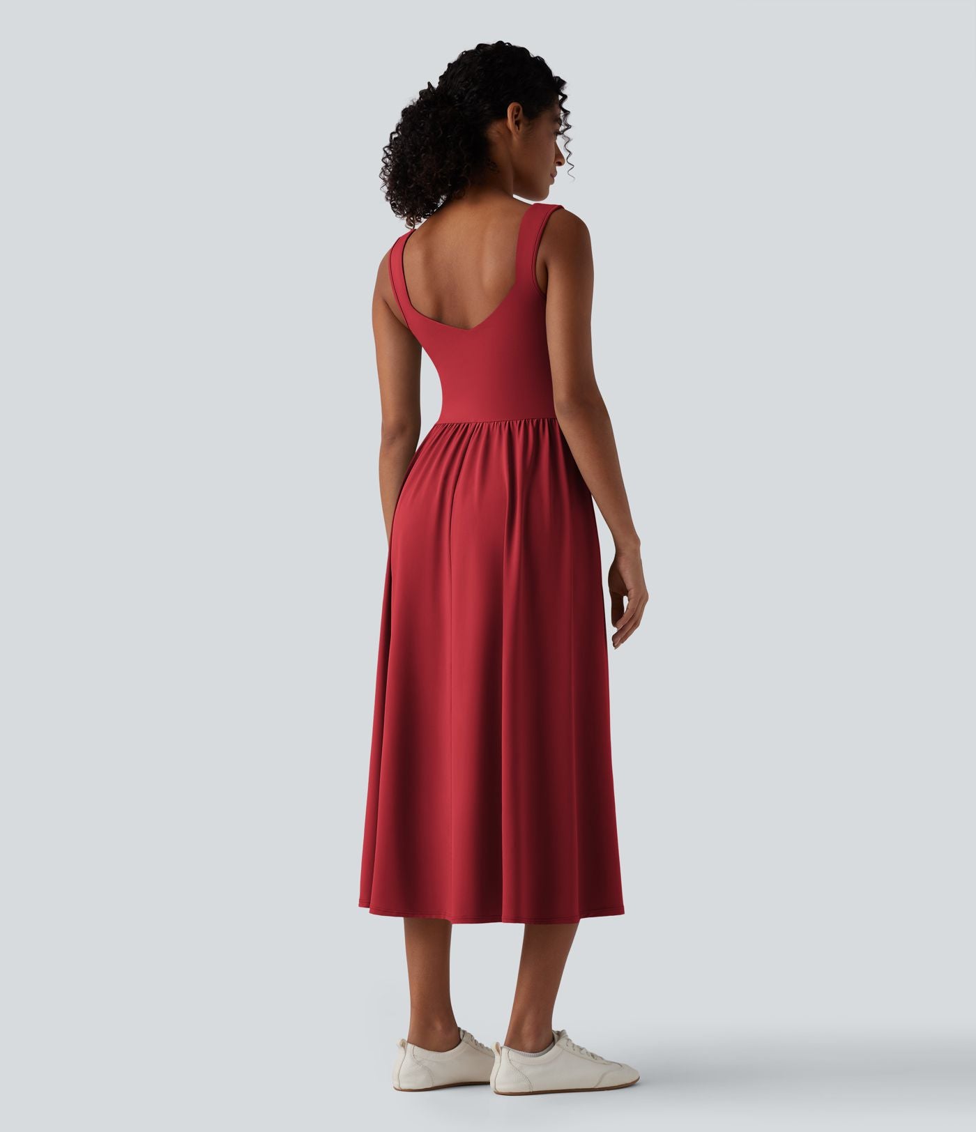 Robe midi fluide sans manches dos croisé ouvert avec poches