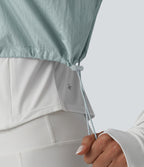 Veste de running 3-en-1 déperlante à capuche avec trous pour les pouces, ourlet arrondi et poches