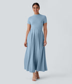 Robe longue décontractée à col montant, manches courtes et poches latérales