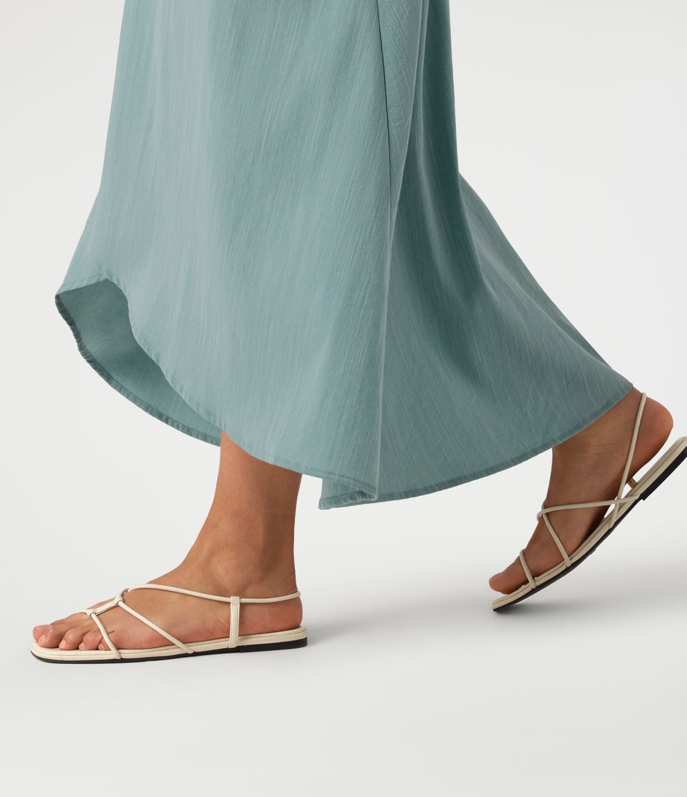 Jupe longue taille haute ourlet asymétrique aspect lin