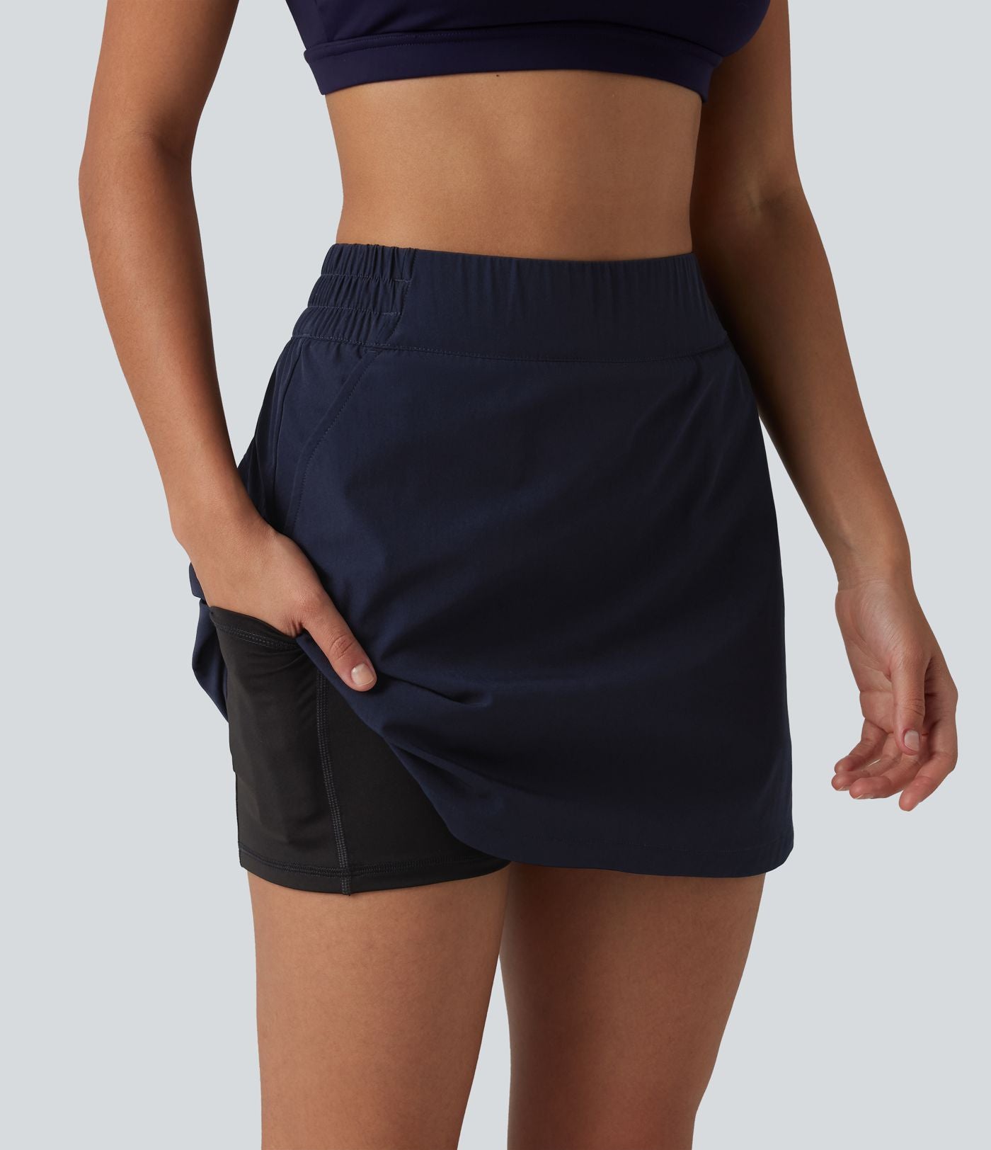 Jupe mini de randonnée 2-en-1 taille haute ourlet arrondi avec poches