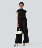 Combinaison pantalon tailleur jambes larges col montant dos goutte d'eau manches courtes avec poches latérales