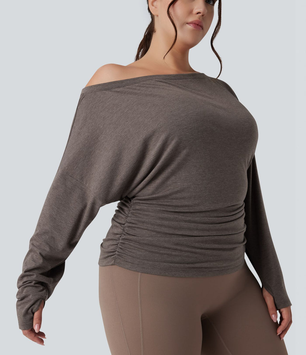 Haut de yoga grande taille asymétrique à manche longue, trou pour le pouce et fronces