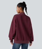 Sweat-shirt en coton polaire col montant coupe décontractée avec poches