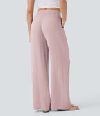 Pantalon large fluide taille haute avec cordon de serrage, poches latérales et aspect lin