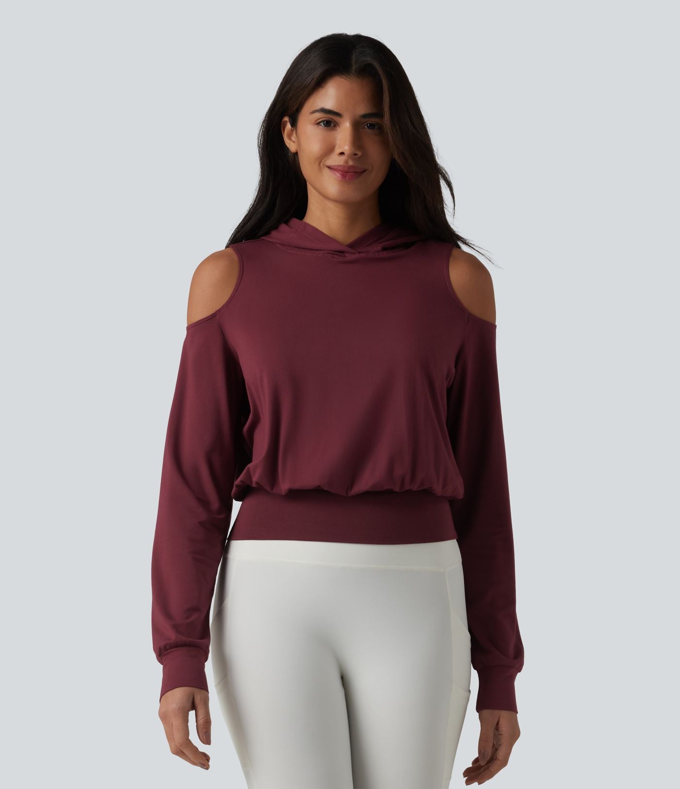 Sweat-shirt de sport à capuche épaules dénudées manches longues