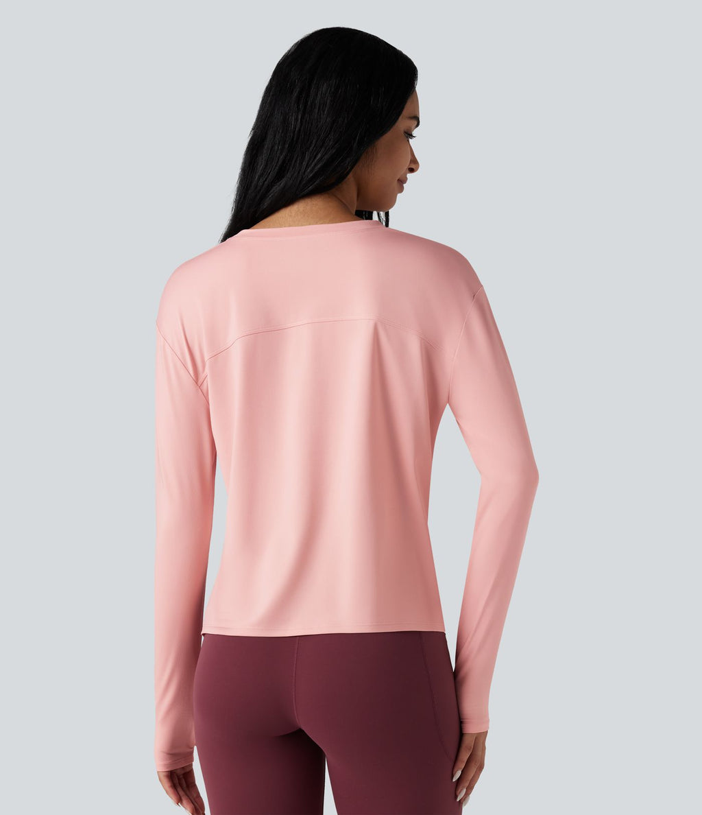 Top de sport running col rond fendu manches longues avec trous pouces