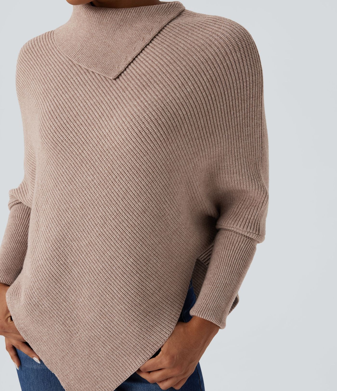 Pull cape décontracté col roulé manches chauve-souris ourlet asymétrique