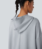 Sweat long à capuche manches longues avec poches