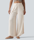 Pantalon ample décontracté à taille mi-haute, fentes, aspect lin, cordon de serrage et poches