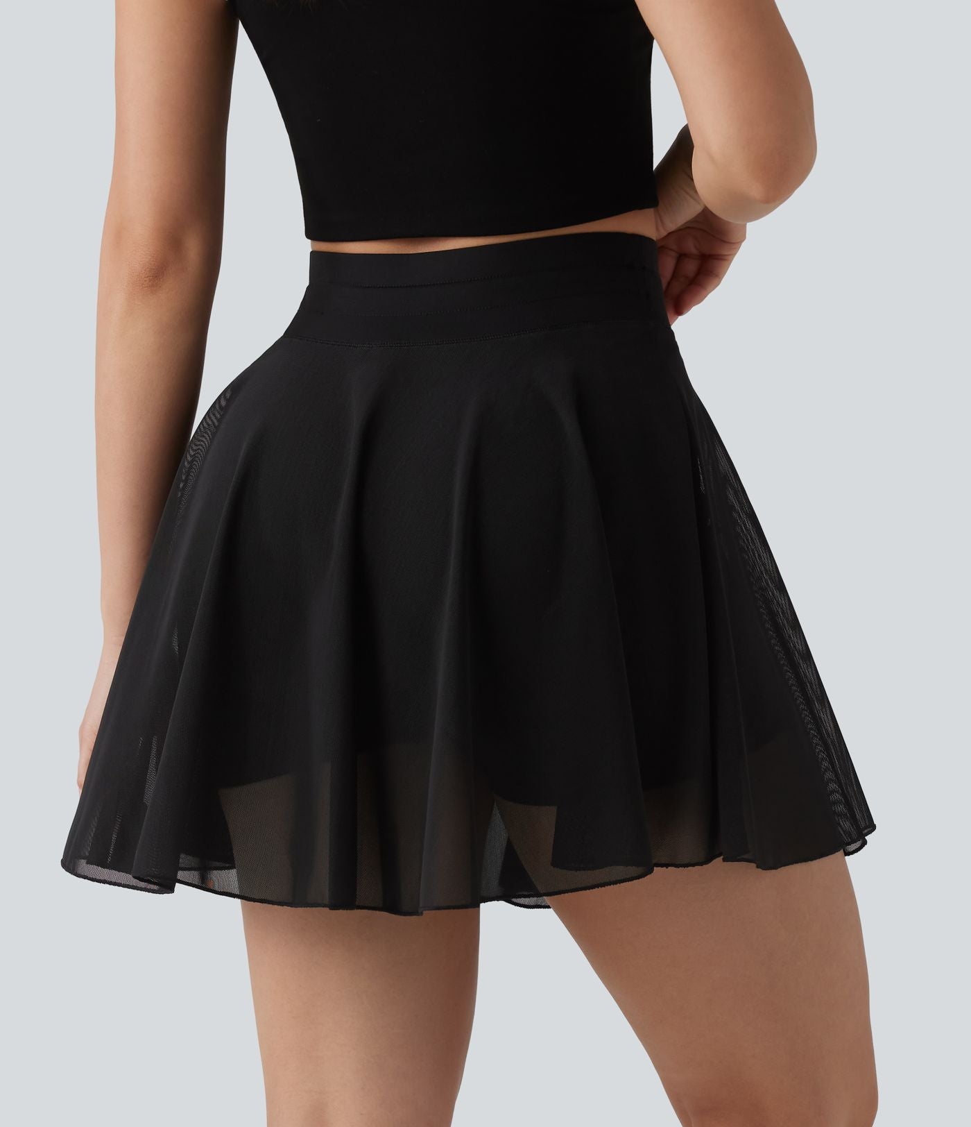 Jupe mini fluide évasée 2-en-1 taille haute à cordon, empiècements en mesh contrastant, avec poche, version plus longue
