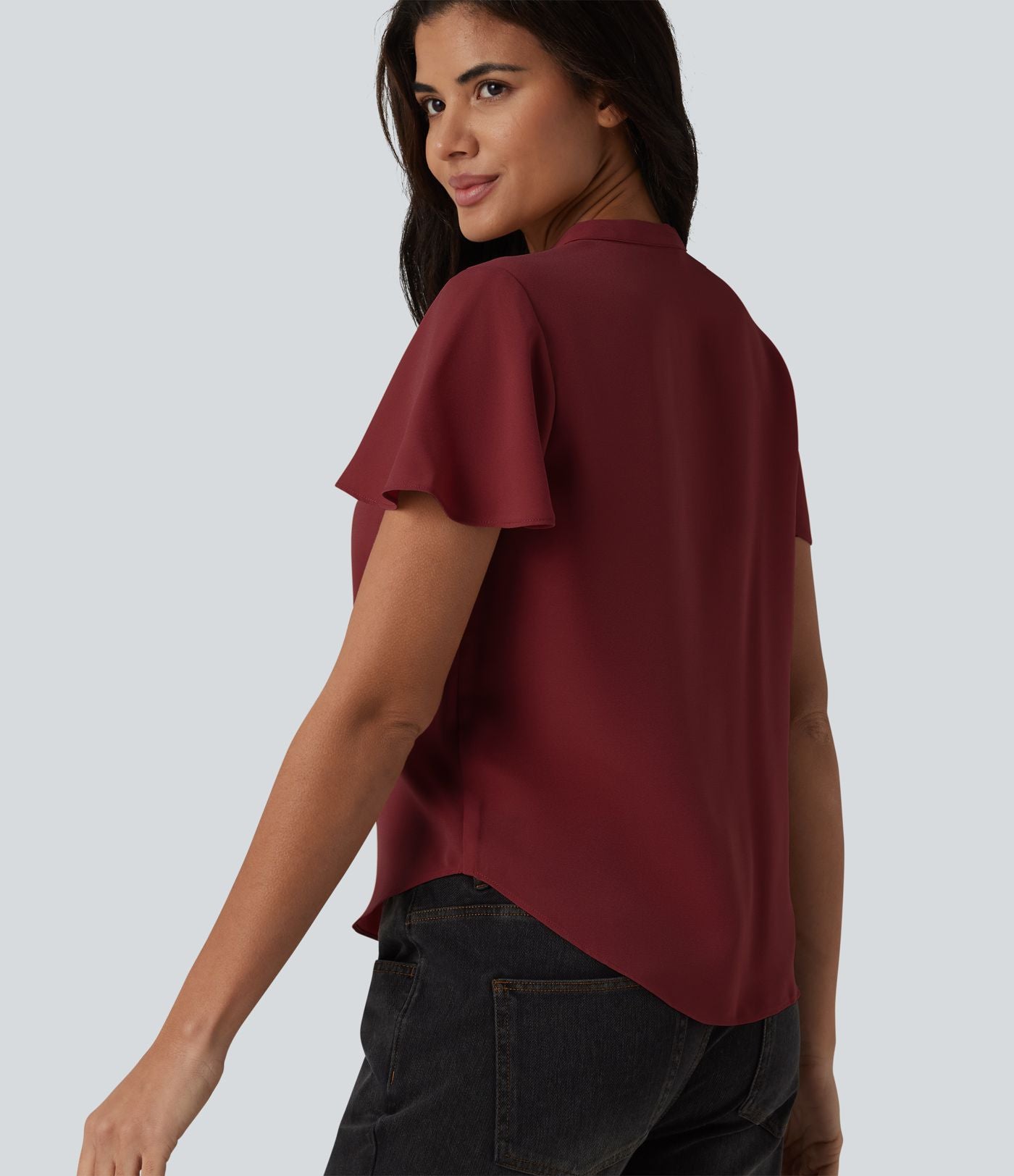 Blouse casual col V à manches volantées et ourlet arrondi