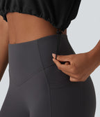 Débardeur de yoga court à capuche avec demi-zip