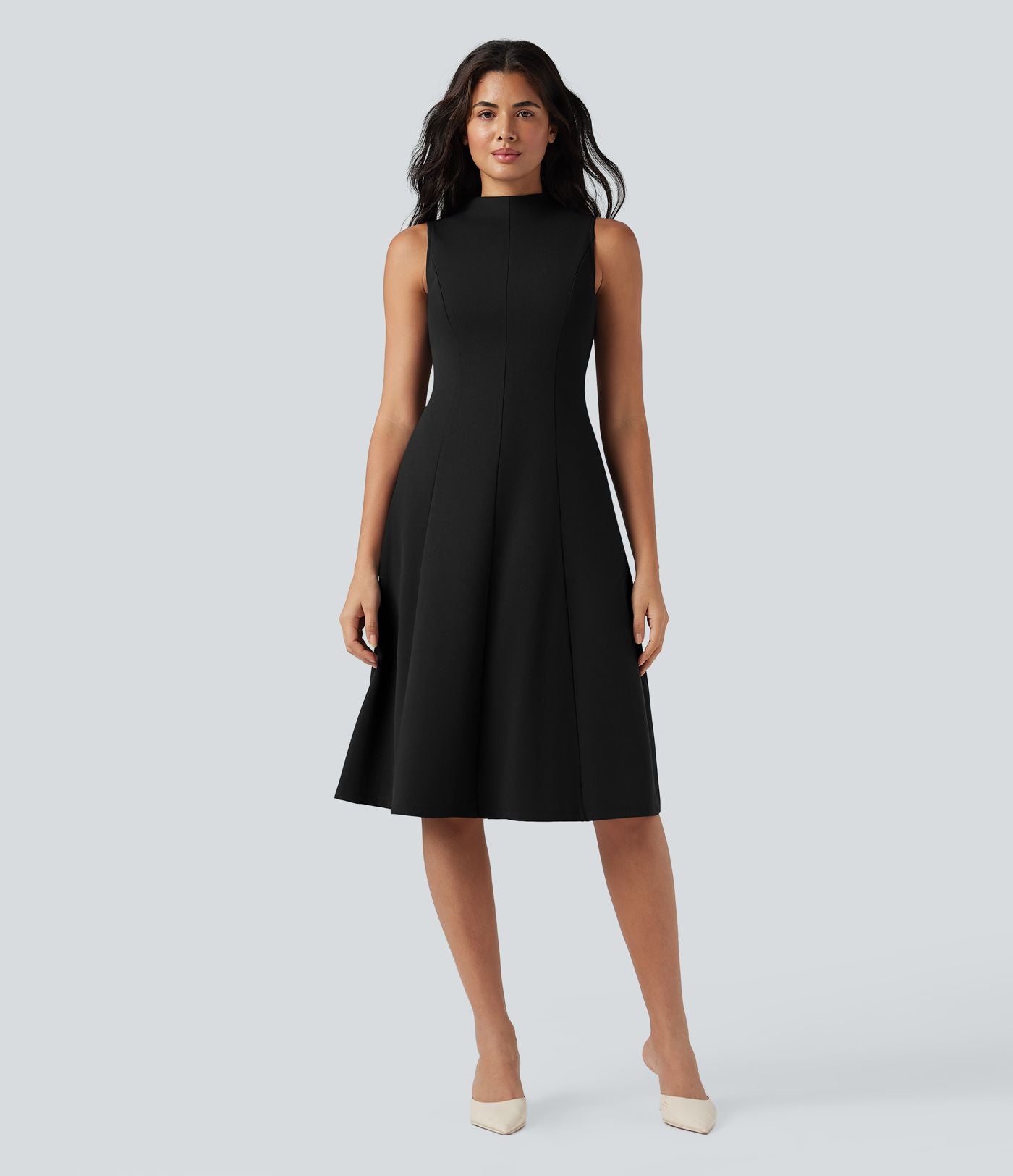 Robe mi-longue col montant sans manches avec poches