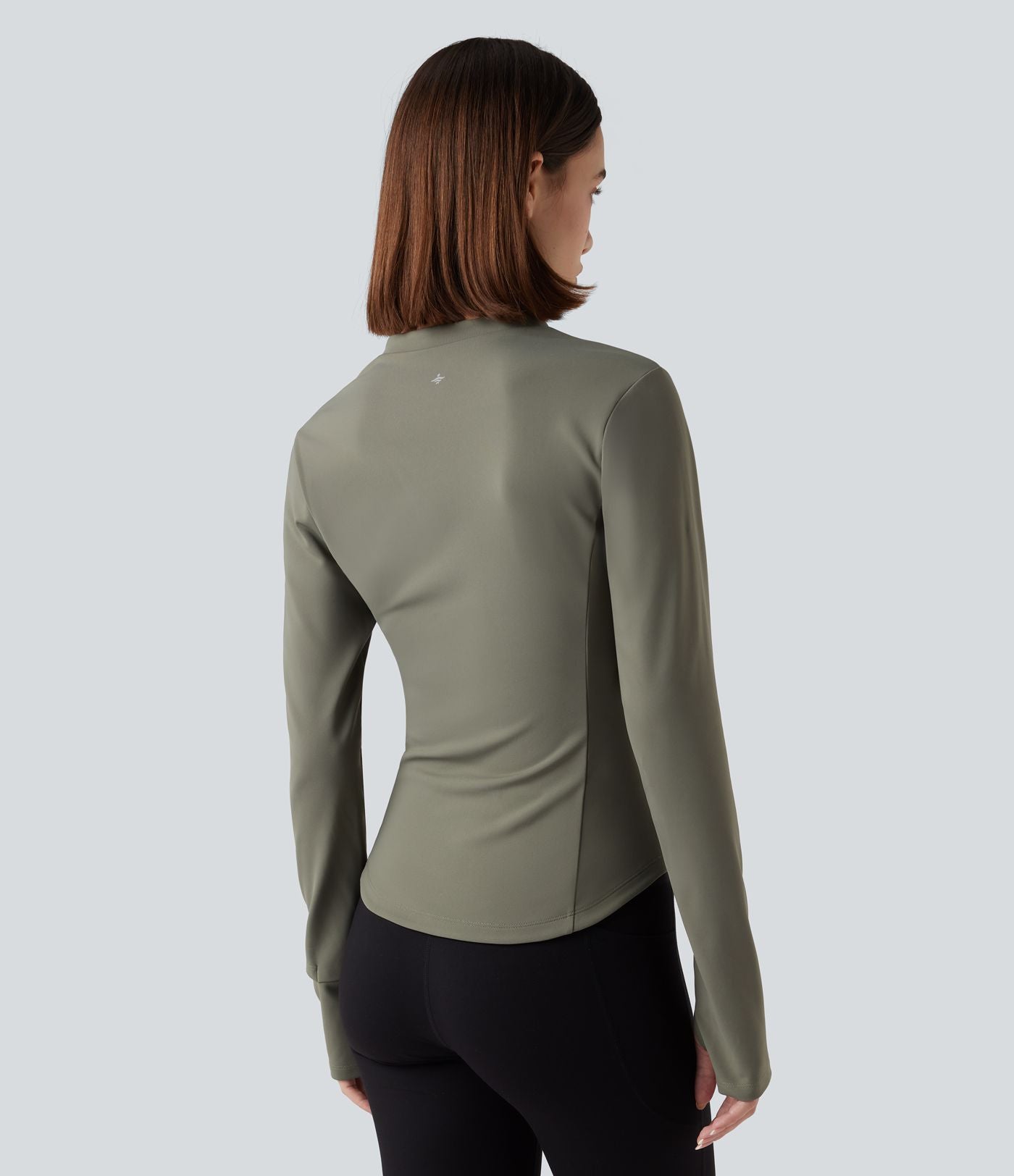 Haut de sport yoga polaire col montant demi-zip à manches longues avec passants pouces