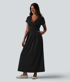 Robe midi à manches courtes chauve-souris et col en V avec poches