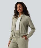 Veste casual côtelée à col montant, manches longues et fermeture zippée avec poches