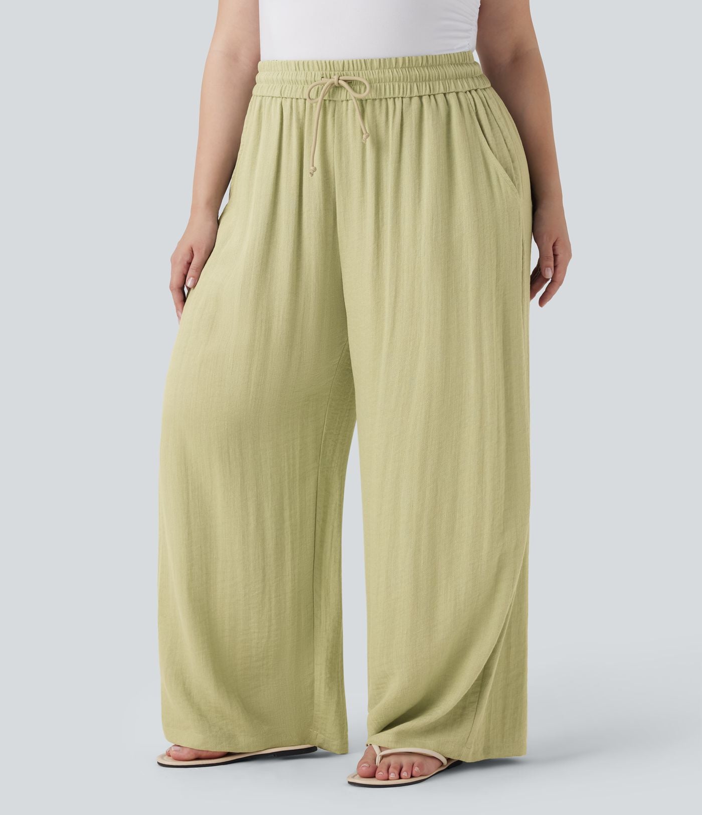 Pantalon décontracté grande taille large fluide taille haute effet lin avec cordon de serrage et poches