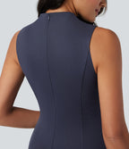 Robe mi-longue col montant sans manches avec poches