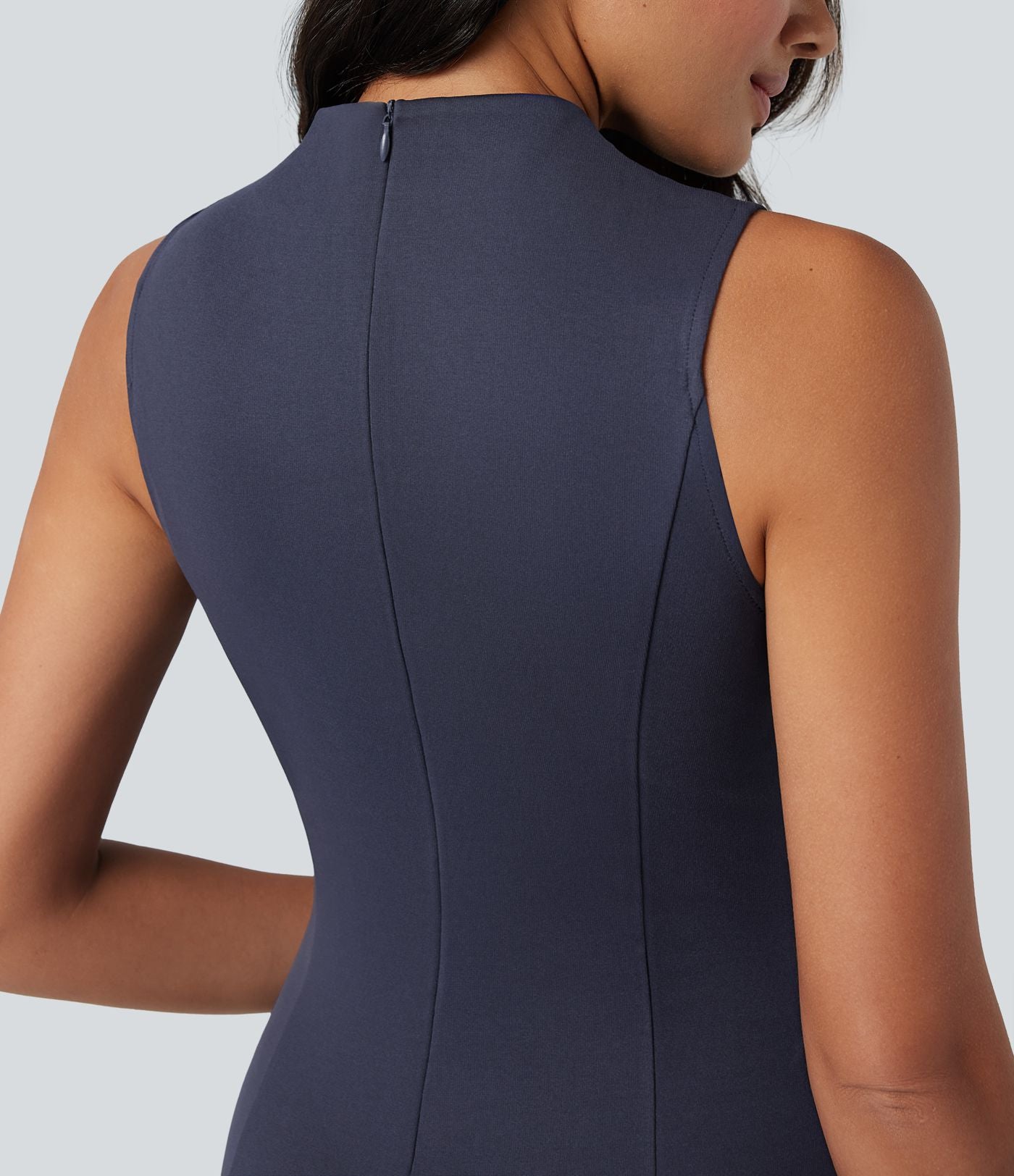 Robe mi-longue col montant sans manches avec poches