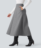 Jupe mi-longue évasée polaire taille haute avec poches