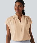 Blouse esprit bureau ample défroissage facile, col V et manches chauve-souris