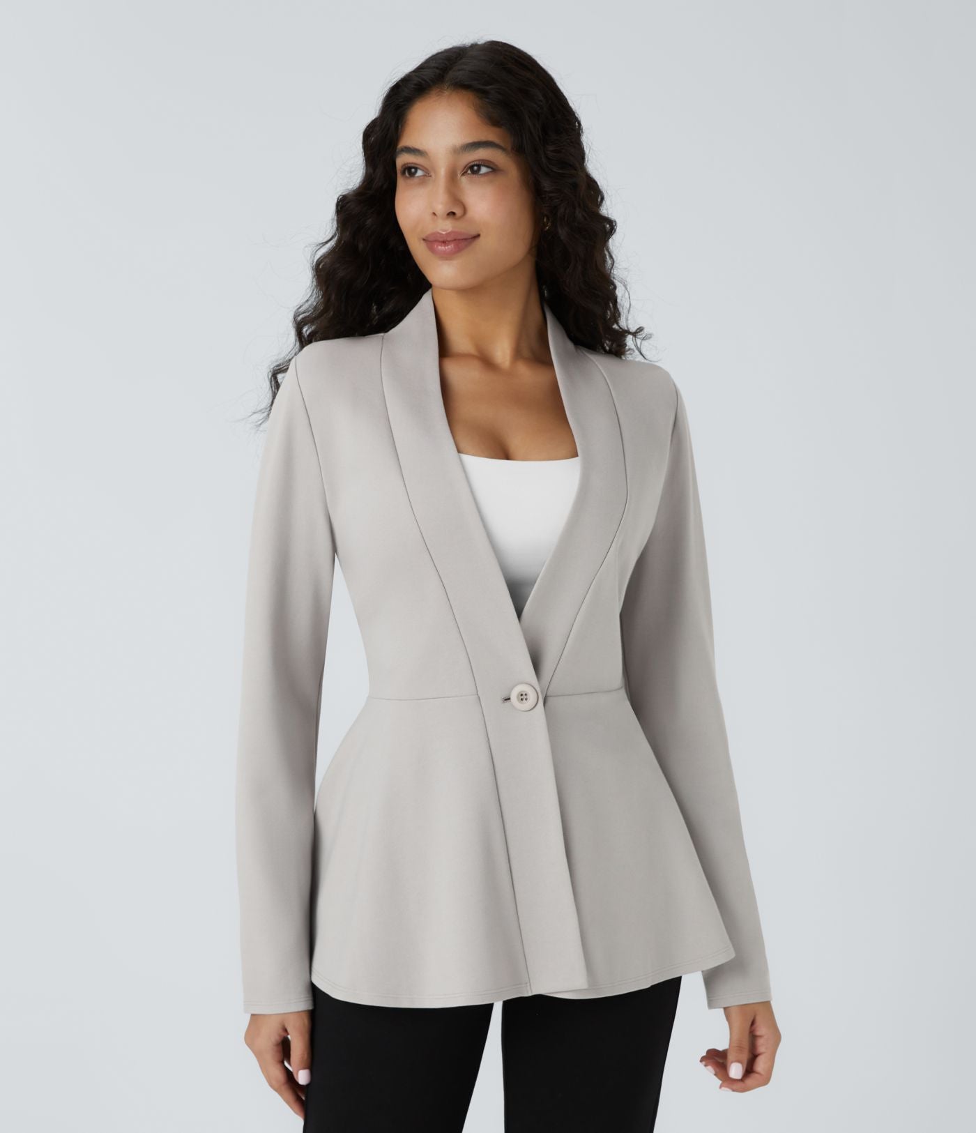 Veste péplum de travail col en V avec un bouton