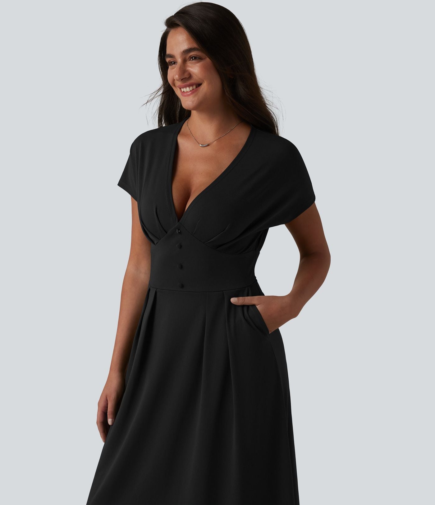 Robe midi à manches courtes chauve-souris et col en V avec poches