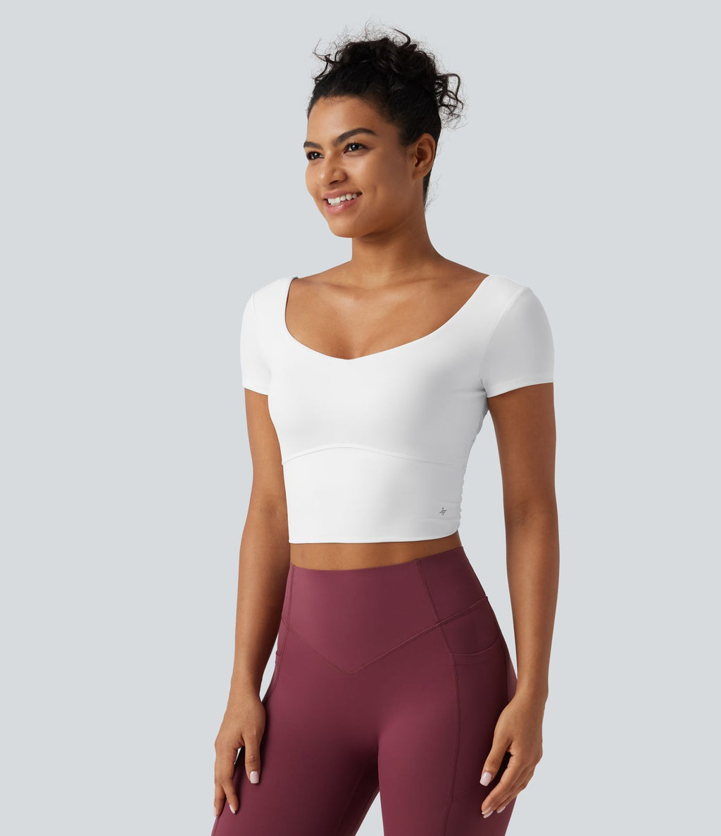 Haut yoga crop SoftlyZero™ séchage rapide Quick Dry à col diamant, manches courtes, mesh et coussinets amovibles