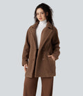 Manteau sherpa col tailleur coupe décontractée avec poches