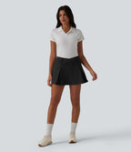 Jupe mini de golf plissée 2-en-1 DayStretch asymétrique taille mi-haute avec poches