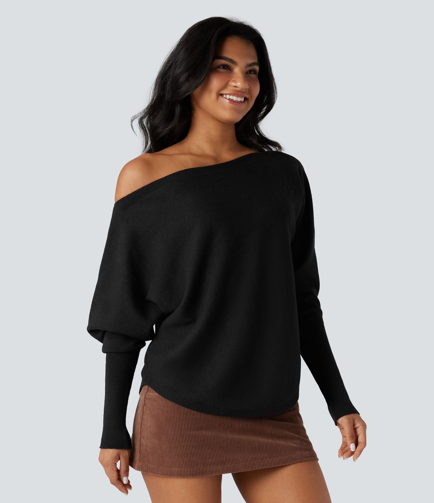 Pull une épaule manches chauve-souris ourlet arrondi