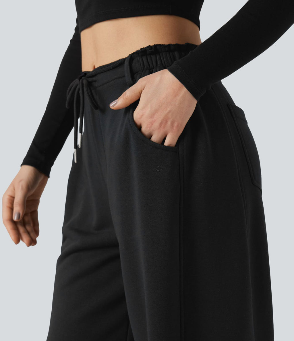 Pantalon jogging large taille mi-haute finition brute avec cordon de serrage et poches